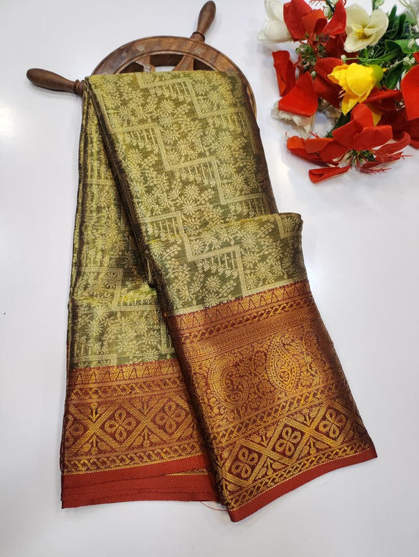 One gram tissue saree with elegant shine and traditional design, front image.