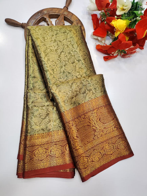 One gram tissue saree with elegant shine and traditional design, front image.