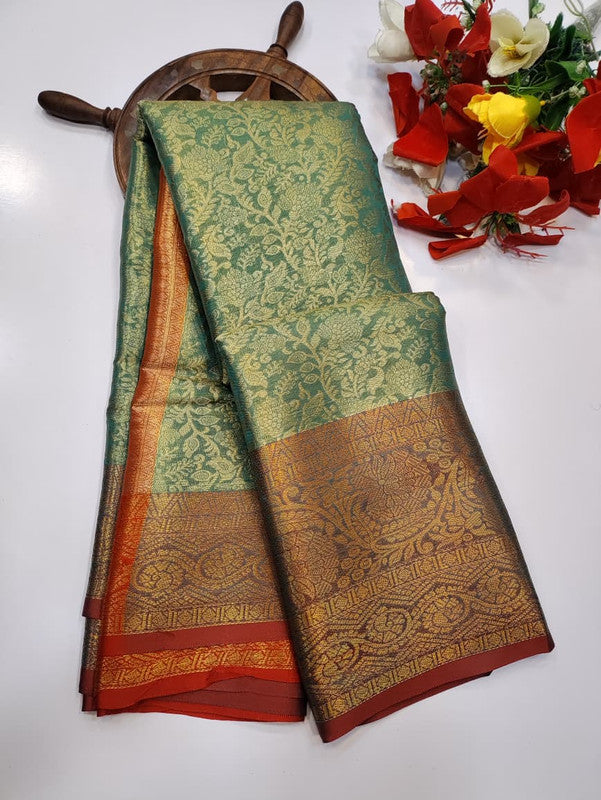 One gram tissue saree with elegant shine and traditional design, front image.