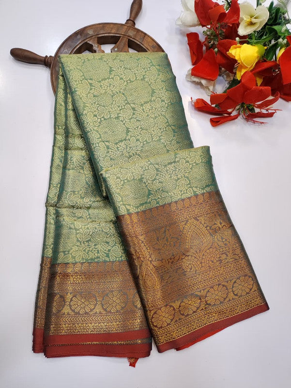 One gram tissue saree with elegant shine and traditional design, front image.