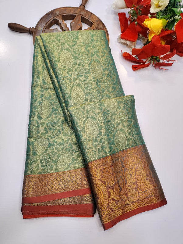 One gram tissue saree with elegant shine and traditional design, front image.