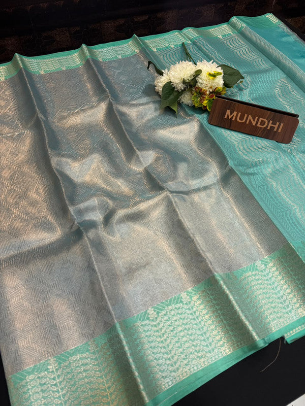 Experience the perfect balance of luxury and tradition with the New Celebrity Tissue Zari Saree.