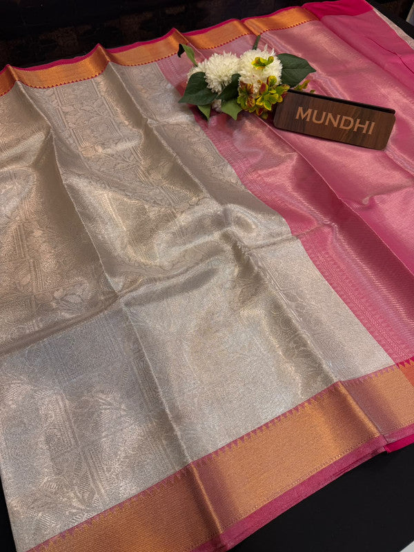 Experience the perfect balance of luxury and tradition with the New Celebrity Tissue Zari Saree.