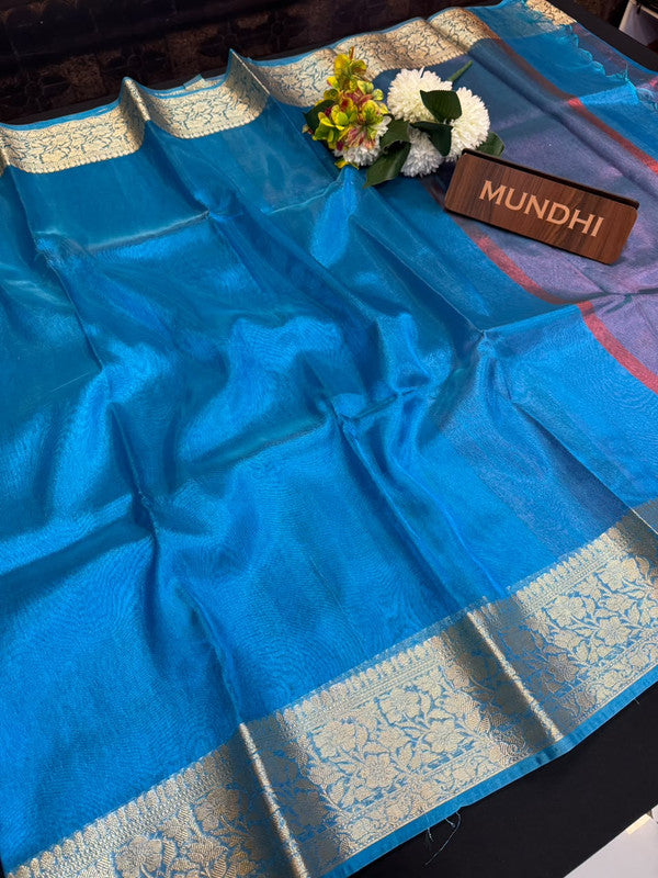 Experience the perfect balance of luxury and tradition with the New Celebrity Tissue Zari Saree.