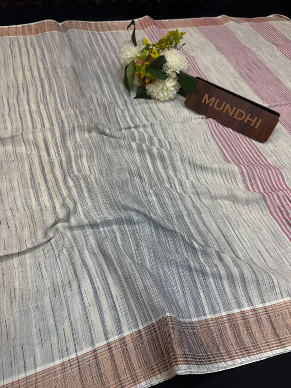 Dorothy cotton saree with zari and plain design