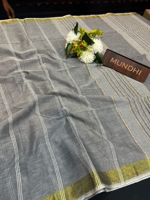 Dorothy cotton saree with zari and plain design