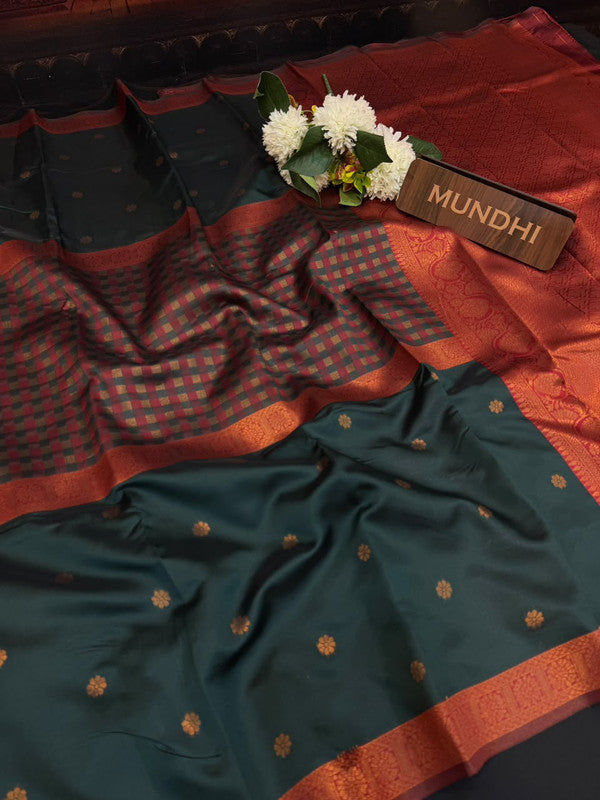 Centre checked soft silk type saree with traditional zari work.