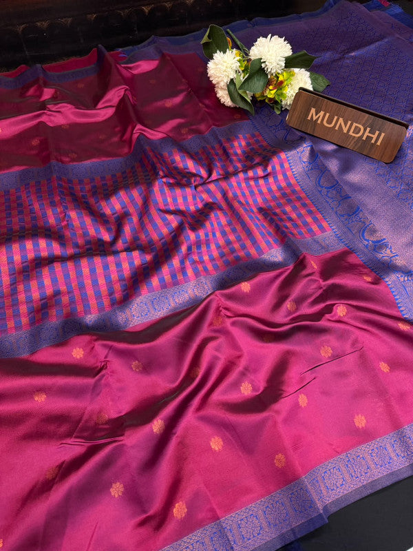 Centre checked soft silk type saree with traditional zari work.