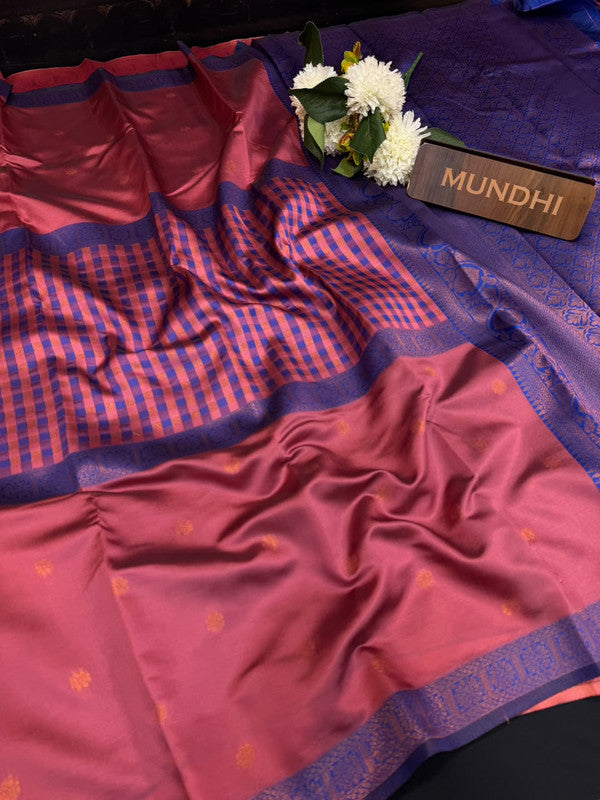 Centre checked soft silk type saree with traditional zari work.