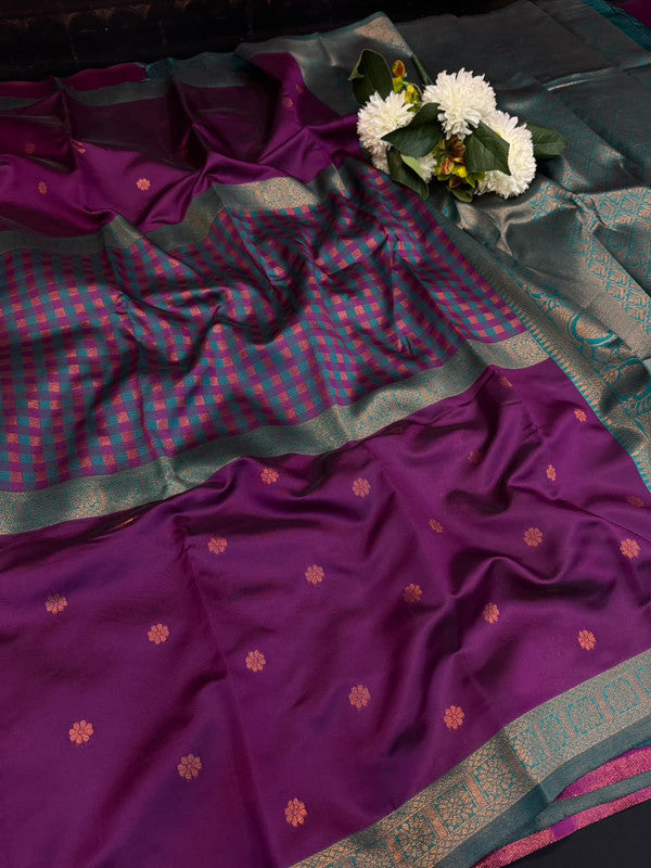 Centre checked soft silk type saree with traditional zari work.