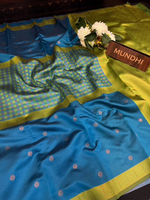 Centre checked soft silk type saree with traditional zari work.