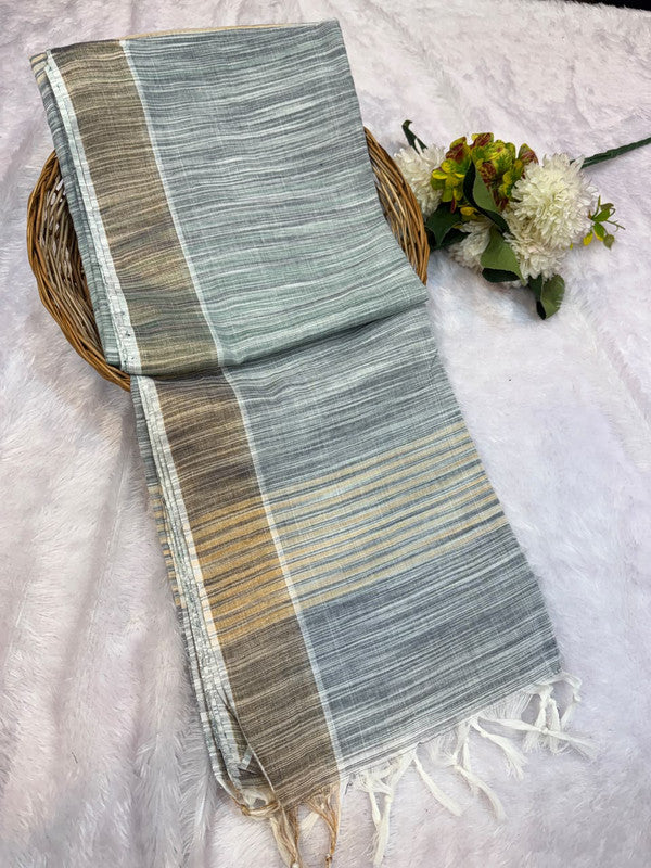 Dorothy cotton saree with zari and plain design
