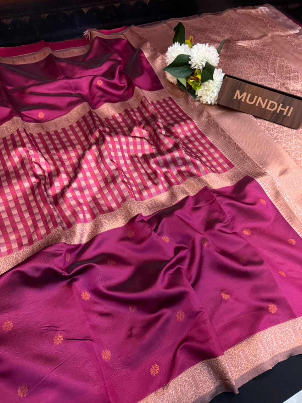 Centre checked soft silk type saree with traditional zari work.