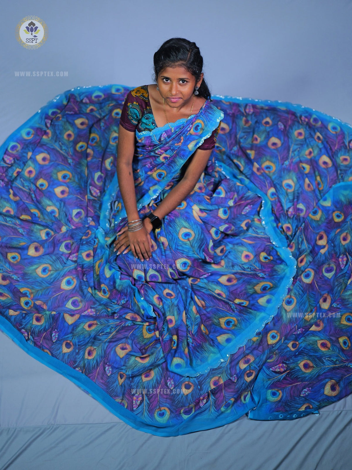 Fancy Peacock Stone Work Saree in premium fancy fabric for wedding wea