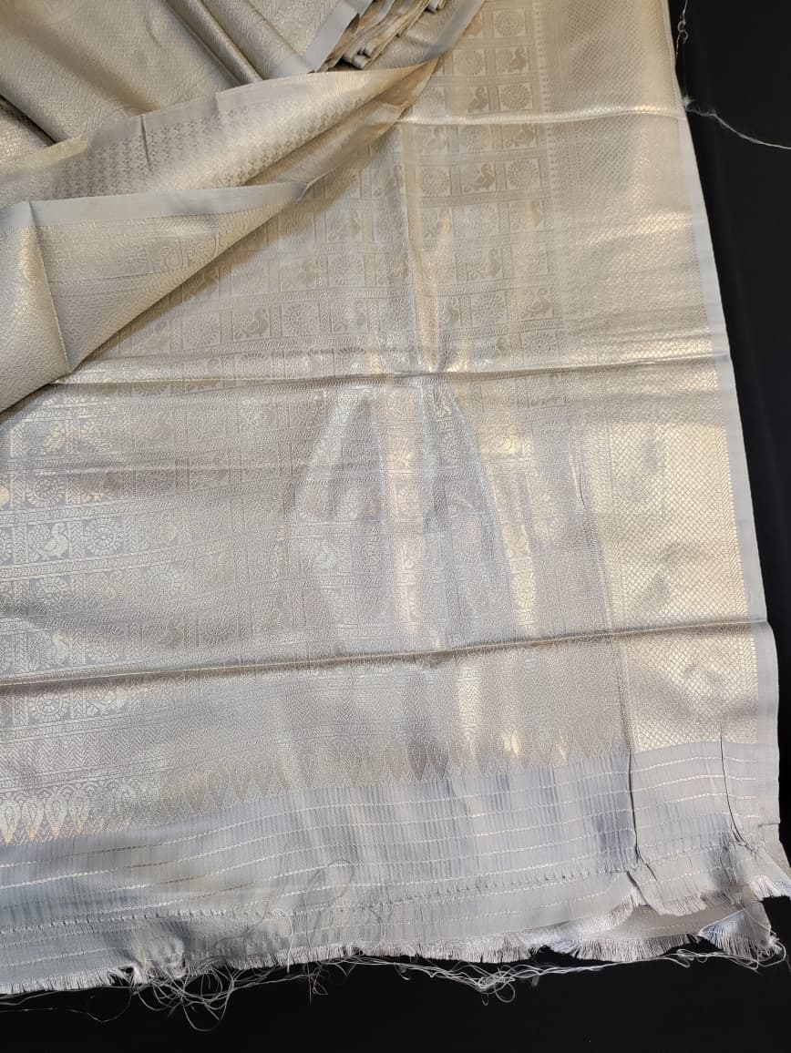 Traditional Nangai Satin Silk saree for Onam celebration and party wear