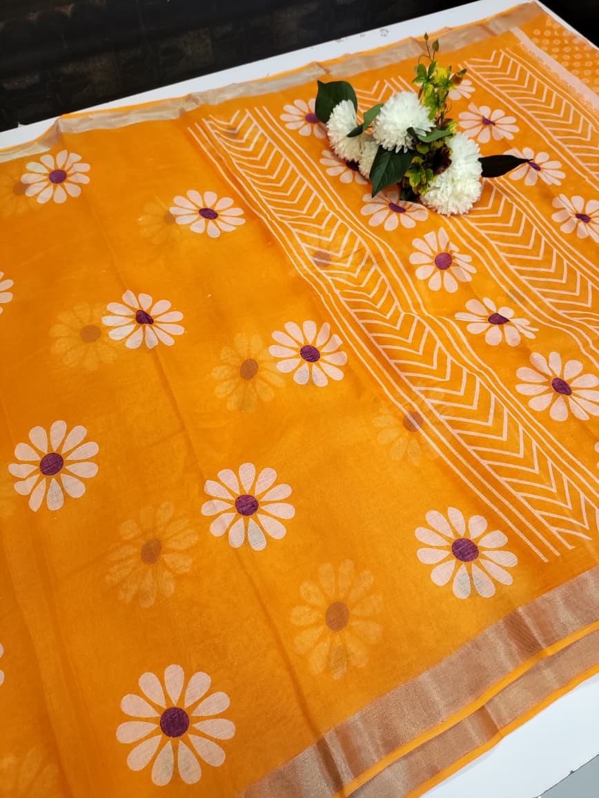 Shop premium Soft Linen Sarees with elegant zari and printed designs.