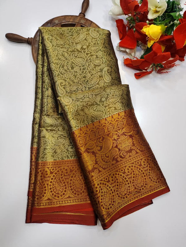 One gram tissue saree with elegant shine and traditional design, front image.