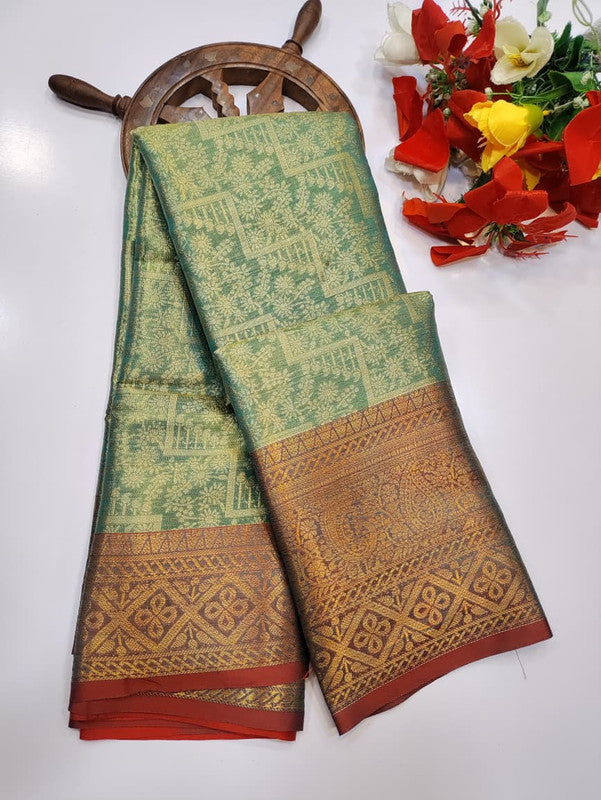 One gram tissue saree with elegant shine and traditional design, front image.