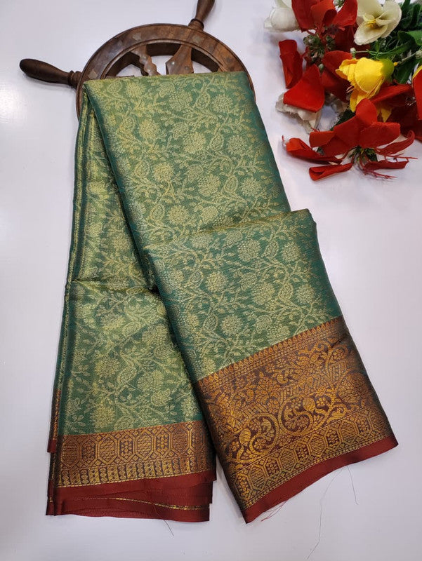One gram tissue saree with elegant shine and traditional design, front image.