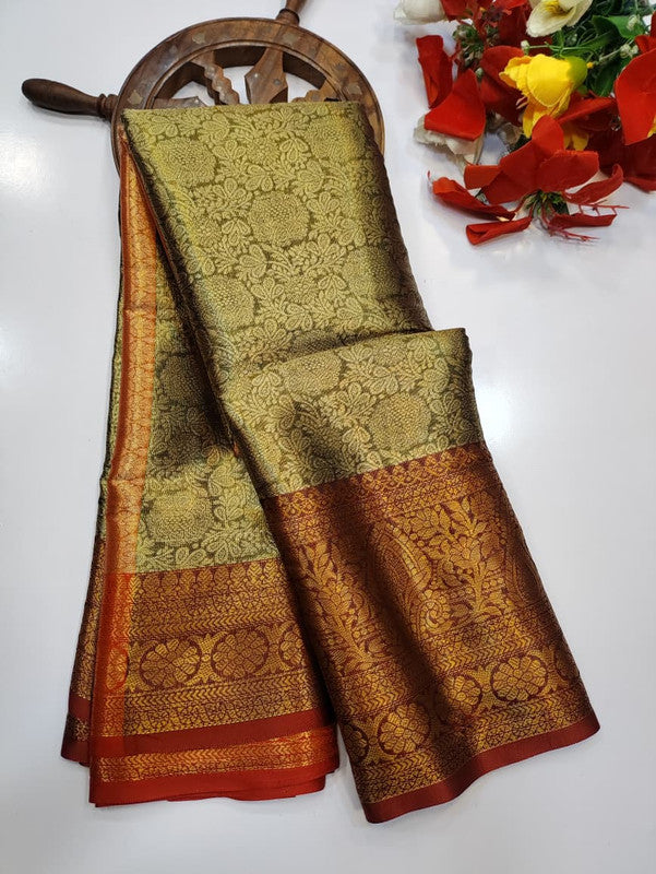 One gram tissue saree with elegant shine and traditional design, front image.