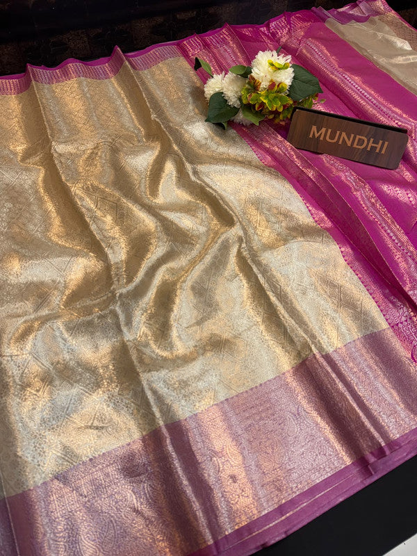 Experience the perfect balance of luxury and tradition with the New Celebrity Tissue Zari Saree.