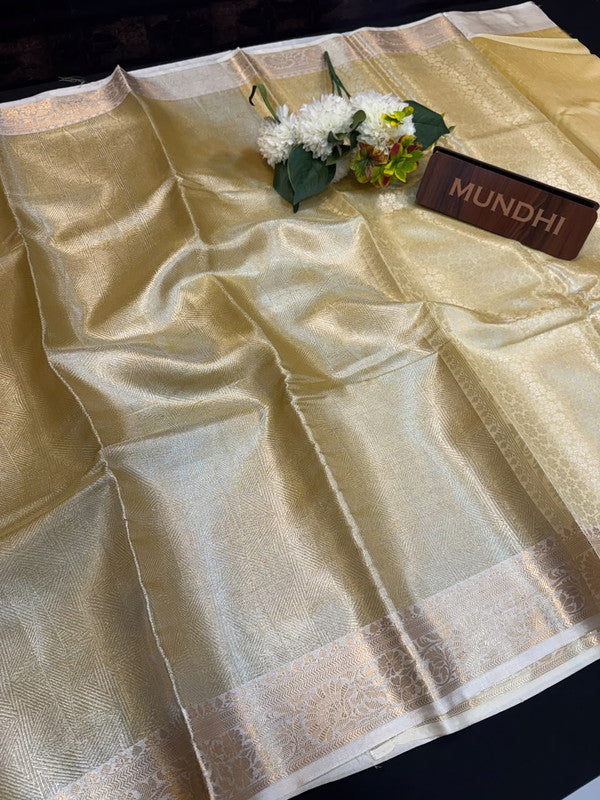 Experience the perfect balance of luxury and tradition with the New Celebrity Tissue Zari Saree.