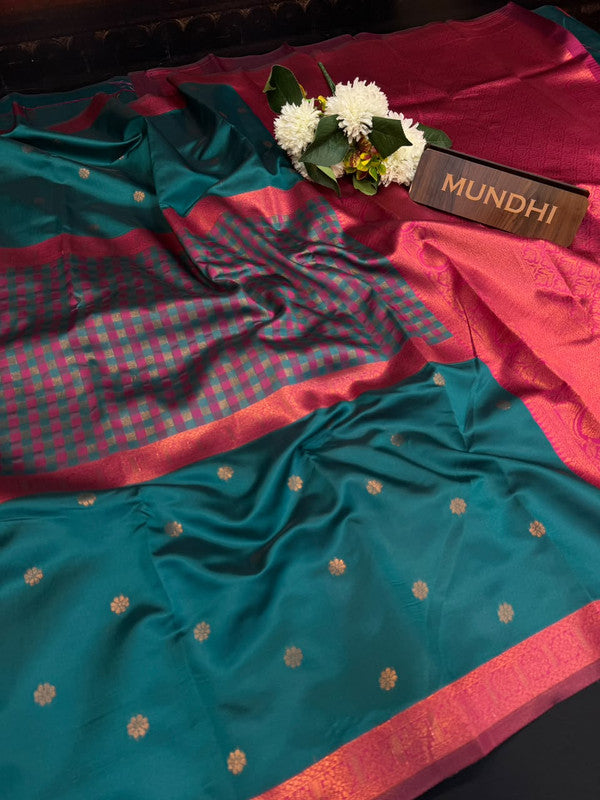 Centre checked soft silk type saree with traditional zari work.