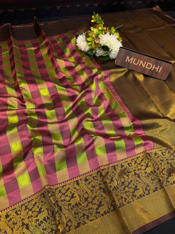 Checked Pavishna Saree in soft silk type fabric with elegant zari work