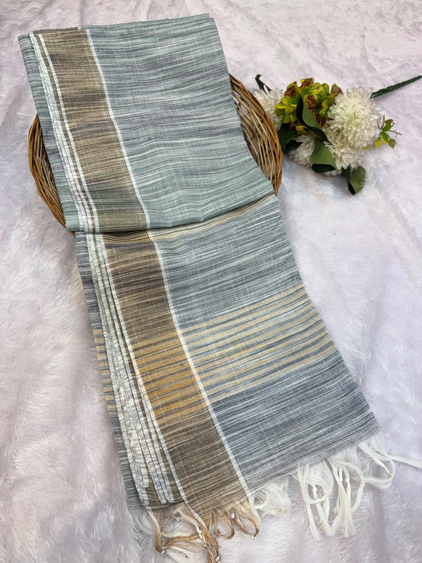 Dorothy cotton saree with zari and plain design