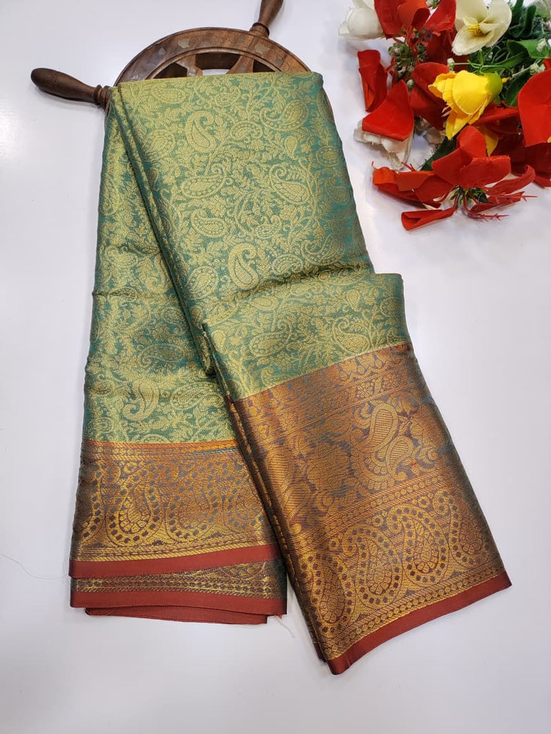 One gram tissue saree with elegant shine and traditional design, front image.