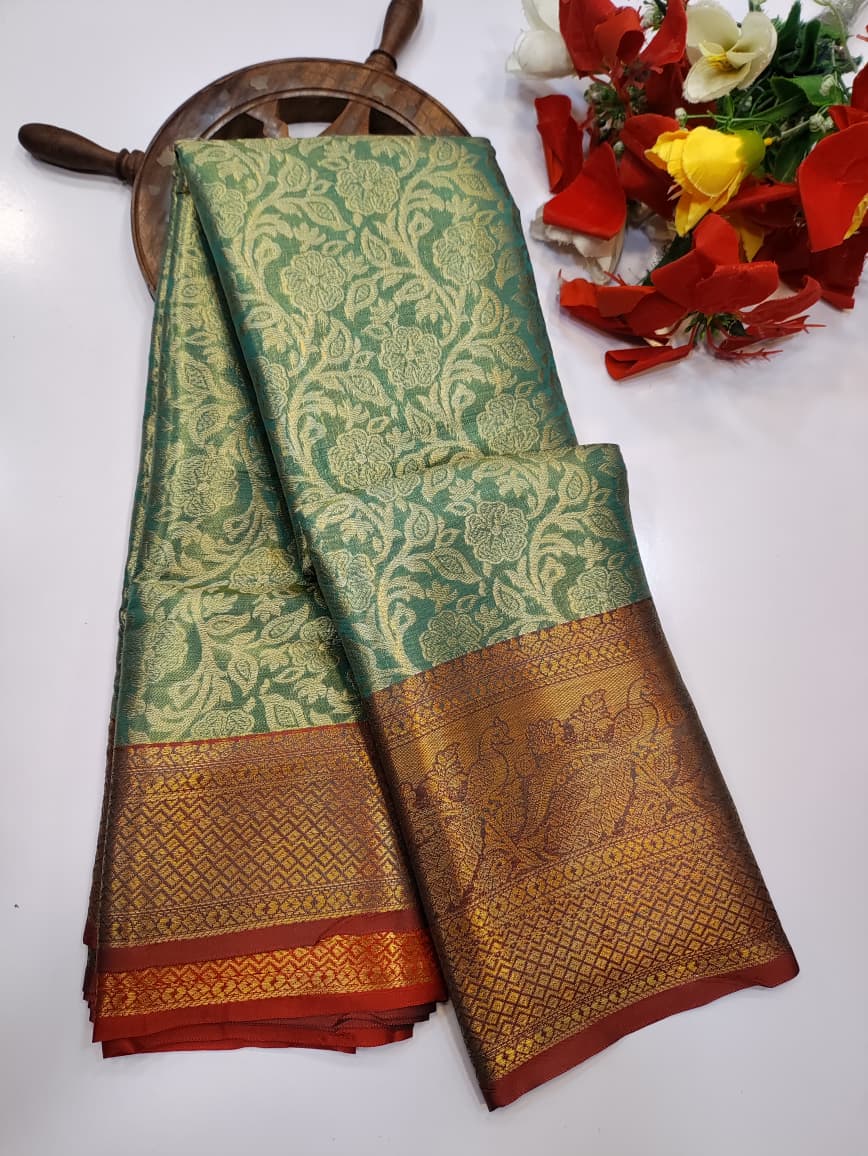 One gram tissue saree with elegant shine and traditional design, front image.