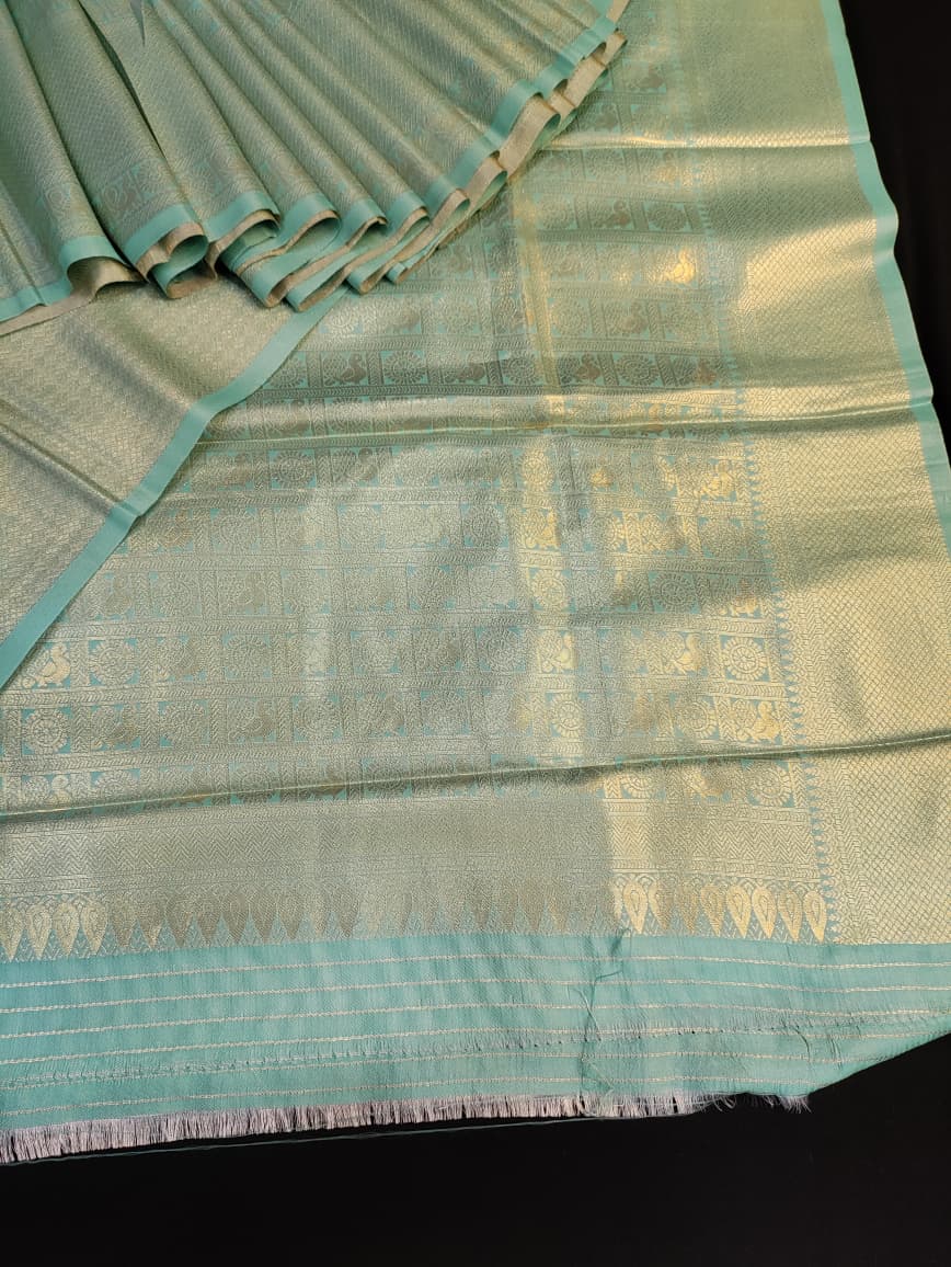 Traditional Nangai Satin Silk saree for Onam celebration and party wear