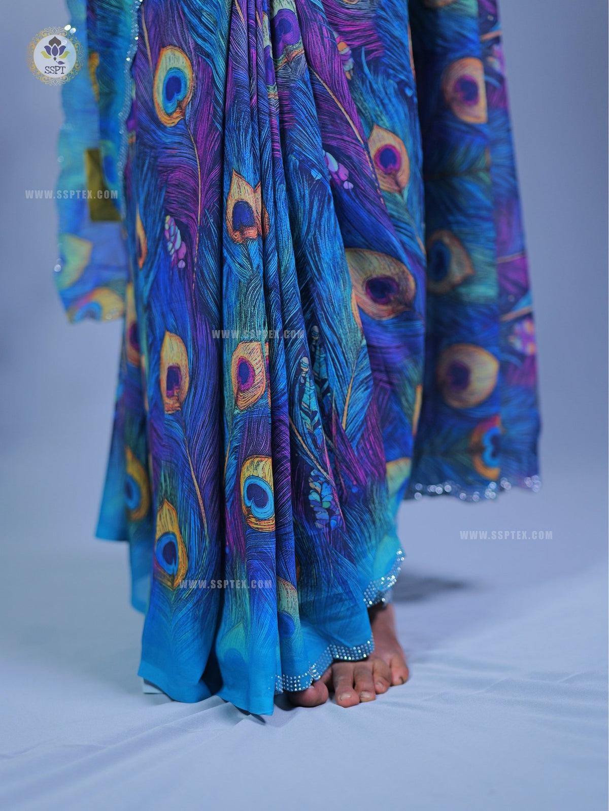 Fancy Peacock Stone Work Saree in premium fancy fabric for wedding wea