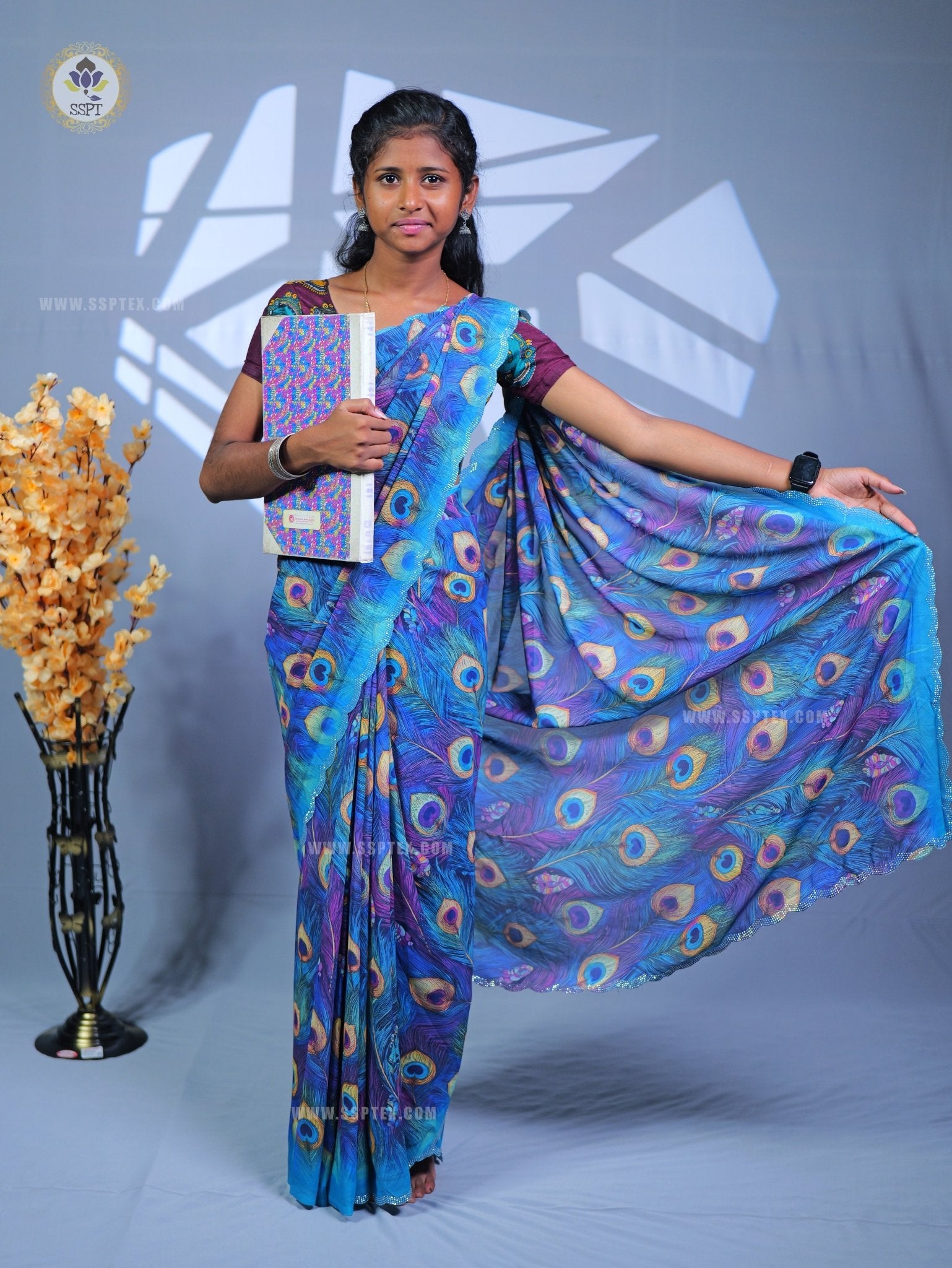 Fancy Peacock Stone Work Saree in premium fancy fabric for wedding wea