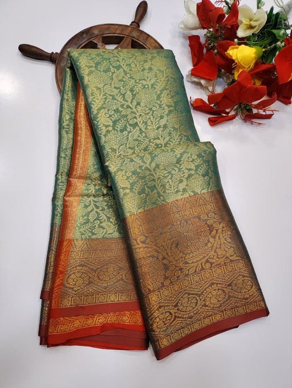 One gram tissue saree with elegant shine and traditional design, front image.